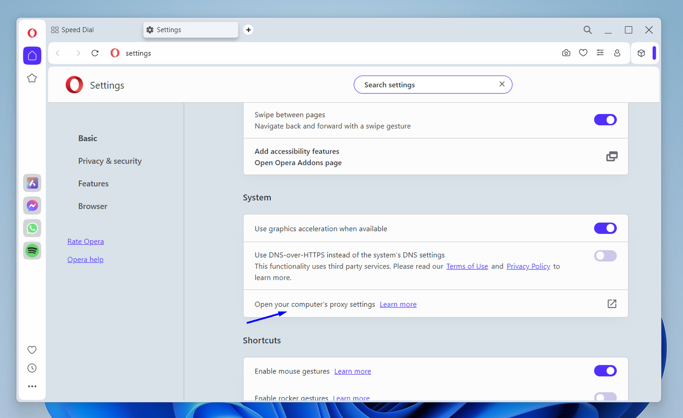 Opera settings page scrolled to the System section with the row Open your computer's proxy settings.